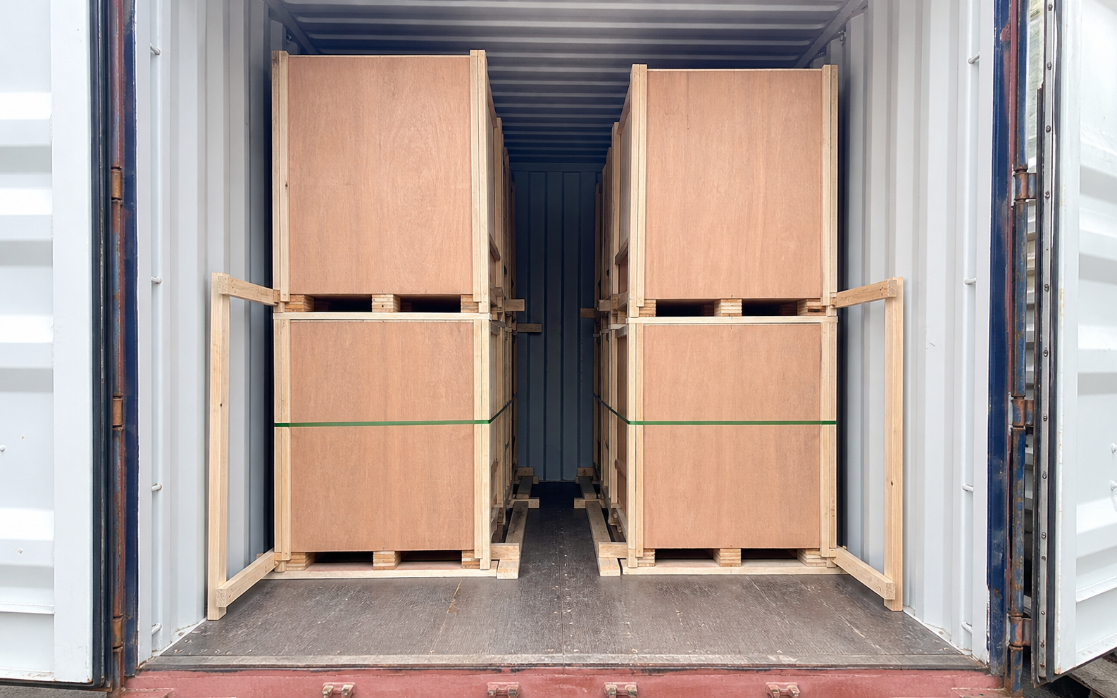 Plywood export crates braced inside a shipping container